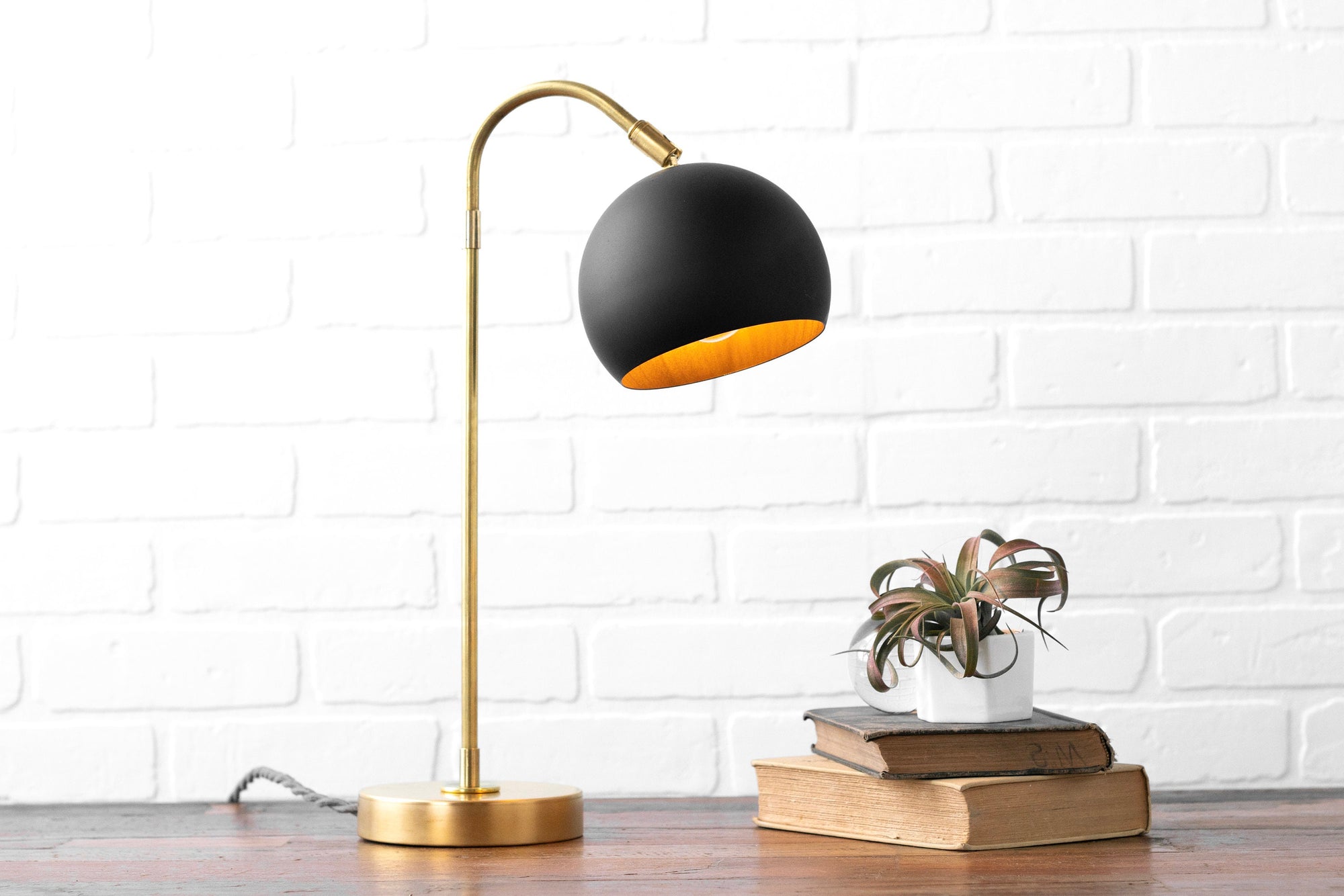 Brass and orders black table lamp